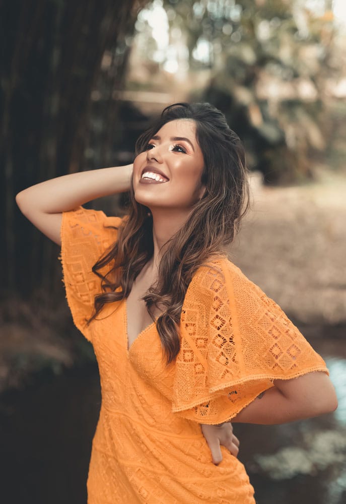 woman showing her great smile after a smile makeover in santa barbara