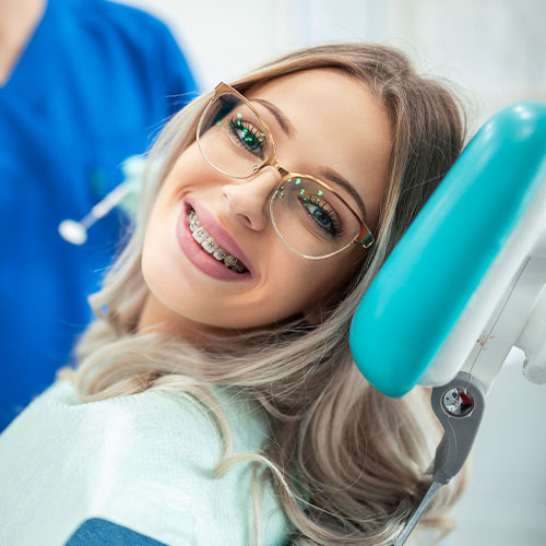 Young woman with fastbraces after visiting the Santa Barbara dentist